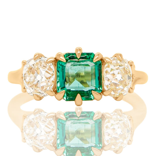 0.95 ct Colombian emerald and old mine cut diamond three stone ring