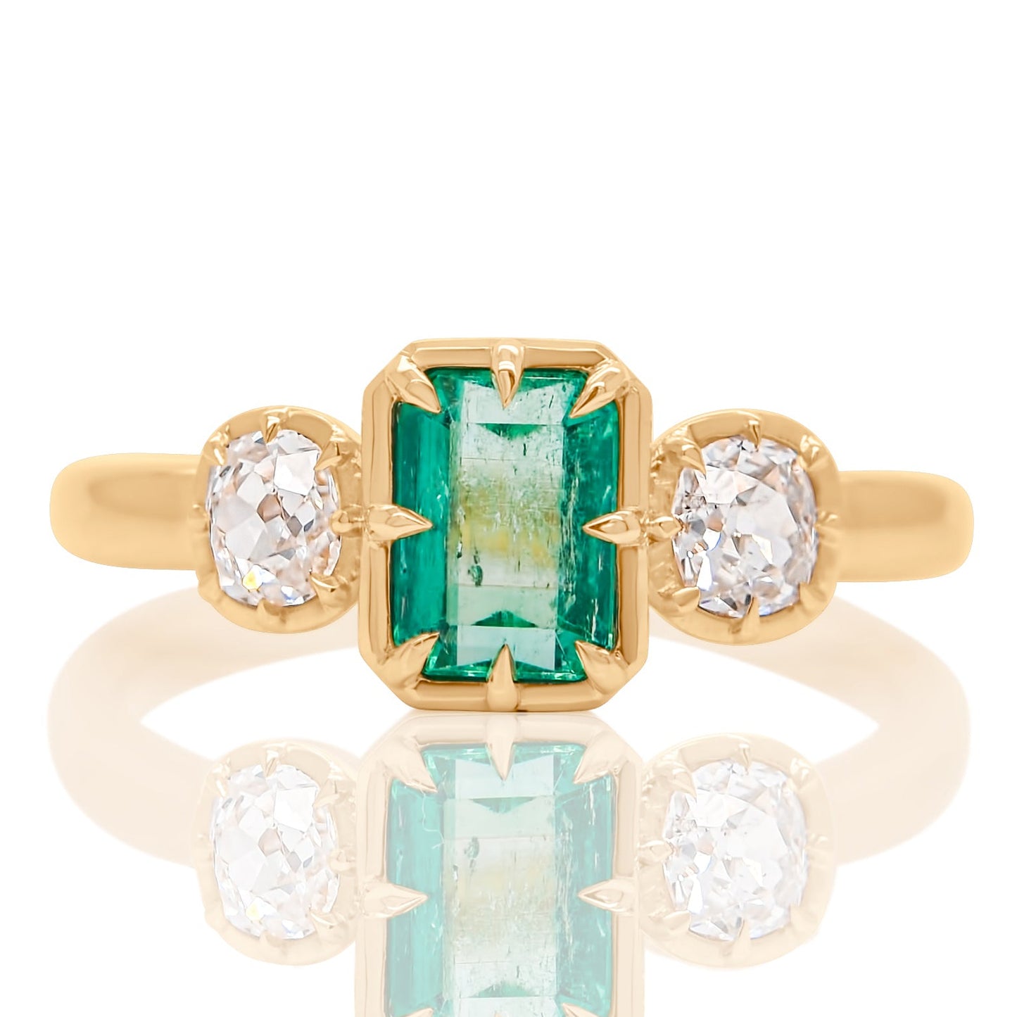 0.93 ct Colombian emerald and old mine cut diamond three stone ring