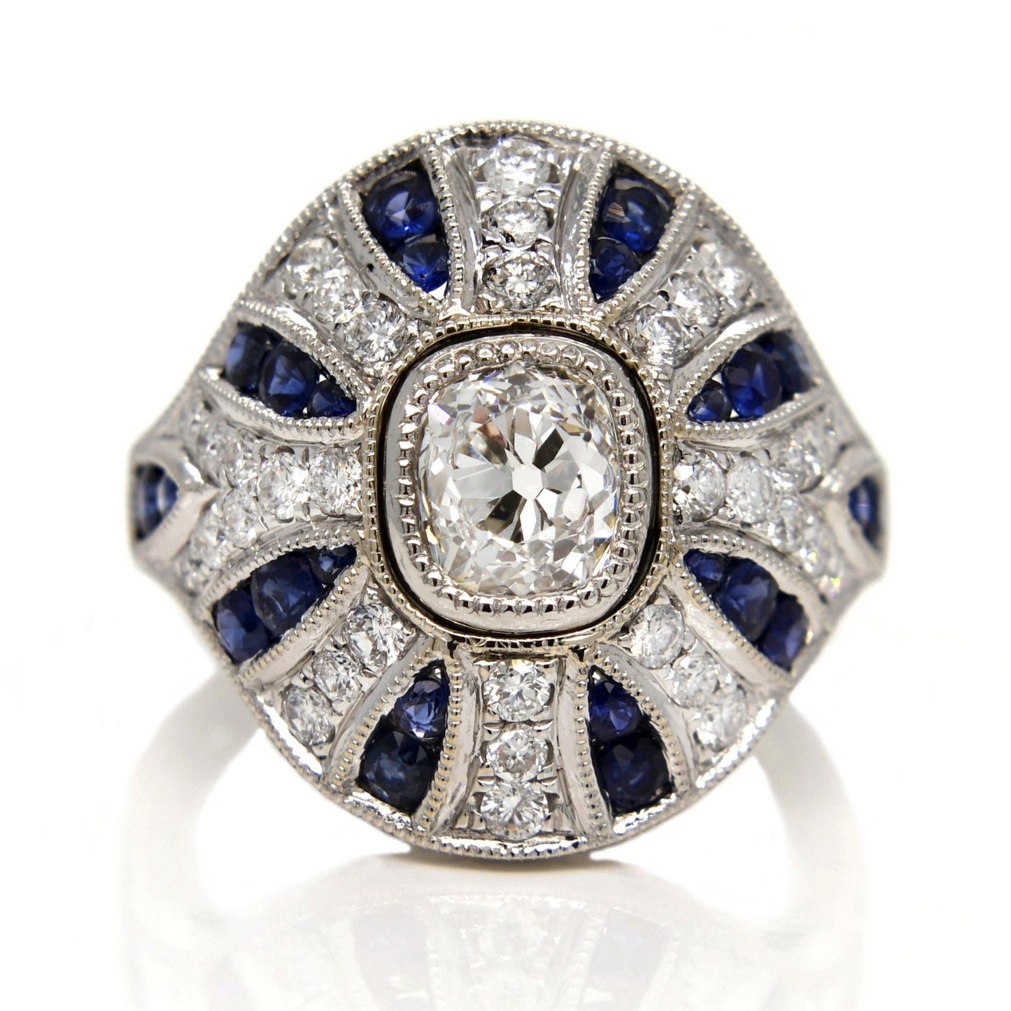 1.10ct old mine cut diamond and sapphire Bombé ring