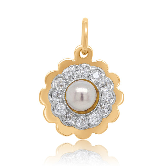 Antique natural pearl and 0.24 ct old mine cut diamond daisy pendant