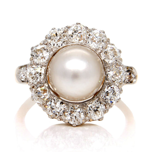 Antique Belle Époque natural pearl and 1.74 ct old European cut diamond daisy ring
