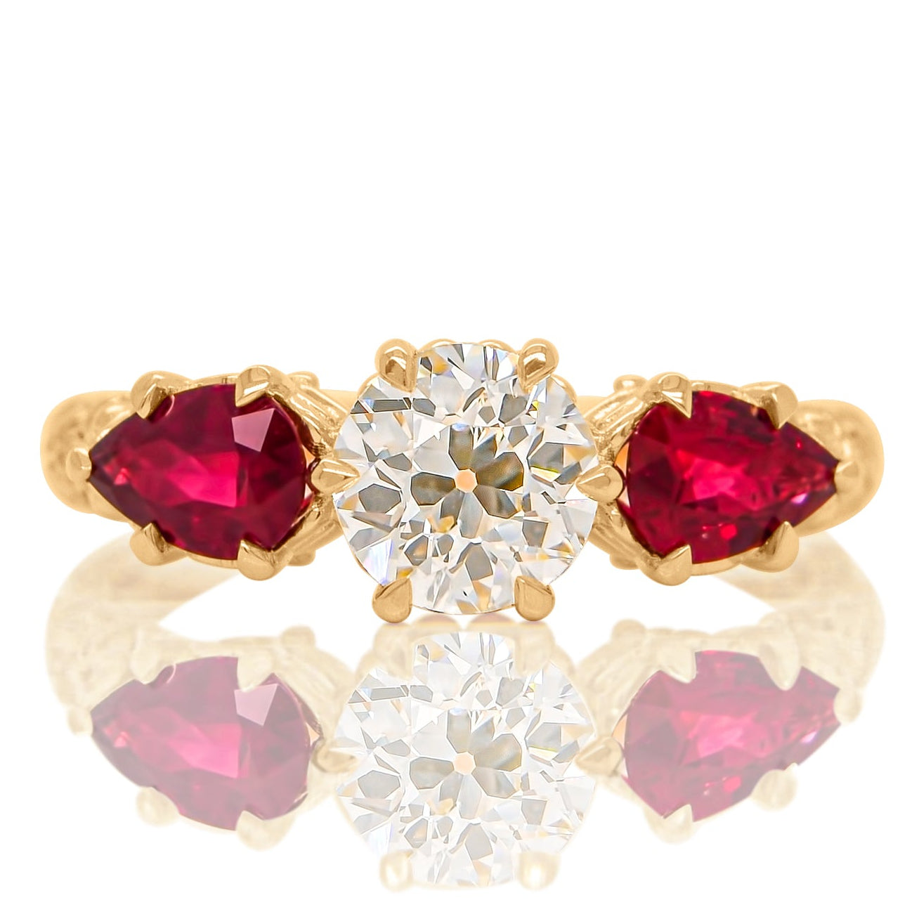 0.84 ct old European cut diamond and ruby three stone ring