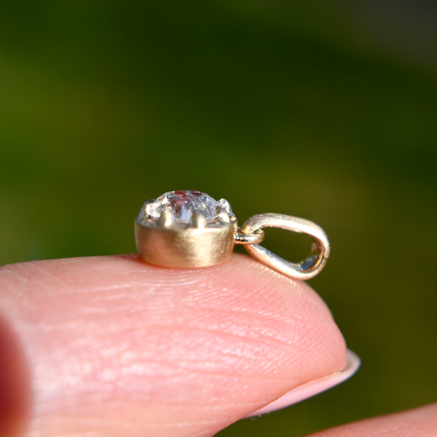0.49 ct old mine cut diamond pendant