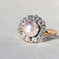 Antique natural pearl and 1.30 ct old mine cut diamond daisy ring