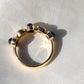 0.66ct old European cut diamond and sapphire cabochon five stone ring