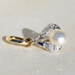 Natural saltwater pearl and diamond tulip pendant