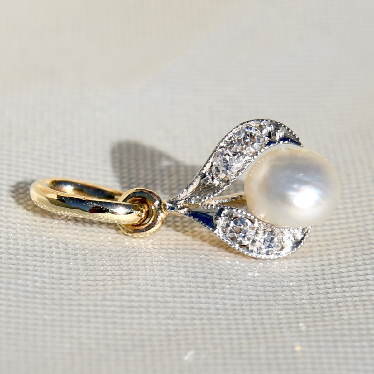 Natural saltwater pearl and diamond tulip pendant