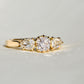 0.63 ct old mine and pear rose cut diamond three stone ring