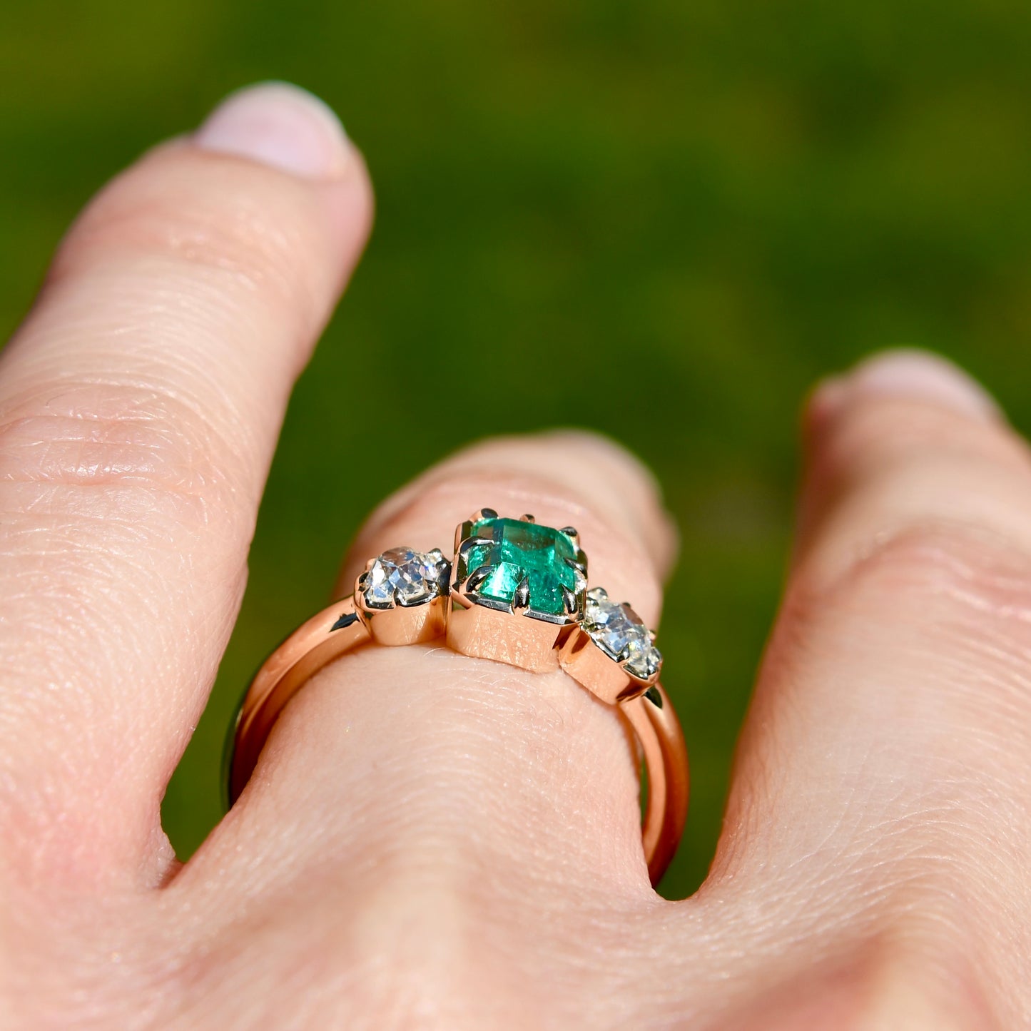 0.93 ct Colombian emerald and old mine cut diamond three stone ring