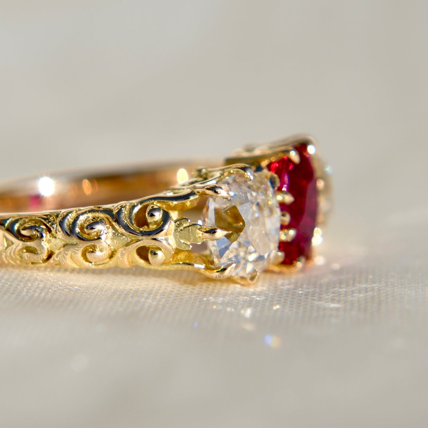 0.94 ct ruby and old mine cut diamond three stone ring