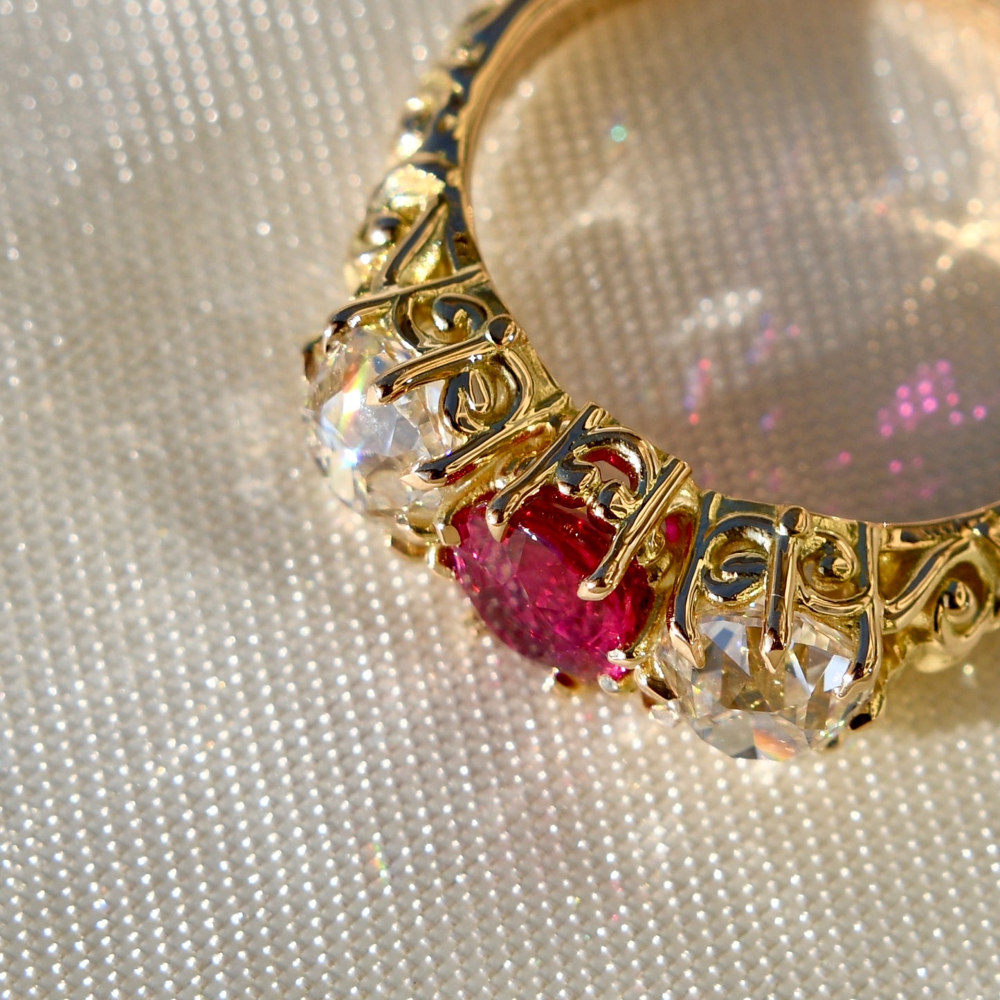 0.94 ct ruby and old mine cut diamond three stone ring