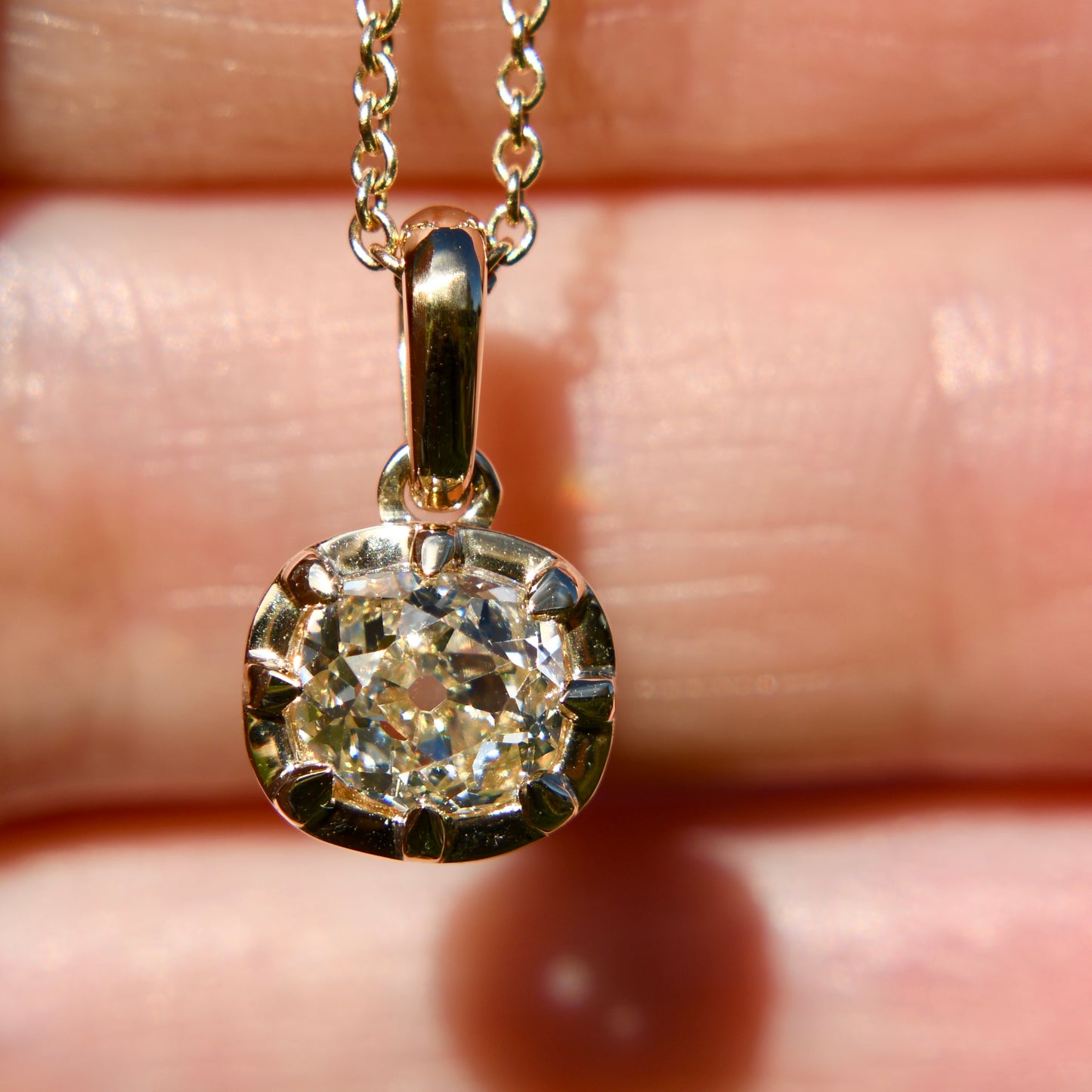 0.87 ct old mine cut diamond pendant