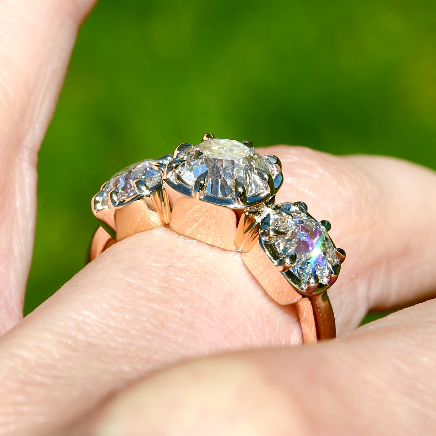 3.35 ct old mine cut diamond three stone ring