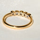 0.52 ct peruzzi cut diamond five stone band ring