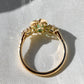 1.34 ct Colombian pear cut emerald and old mine cut diamond three stone ring