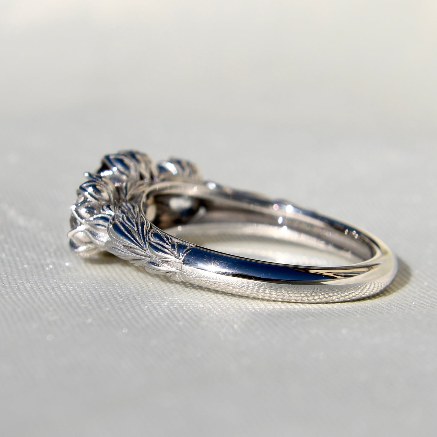 2.97 ct old mine and old European cut diamond tulip three stone ring