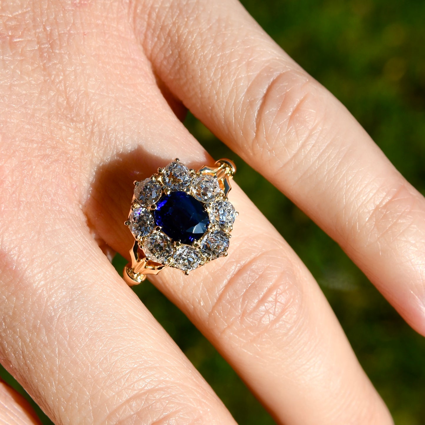 1.15 ct sapphire and old mine cut diamond cluster ring
