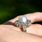 Antique Belle Époque natural pearl and 1.74 ct old European cut diamond daisy ring