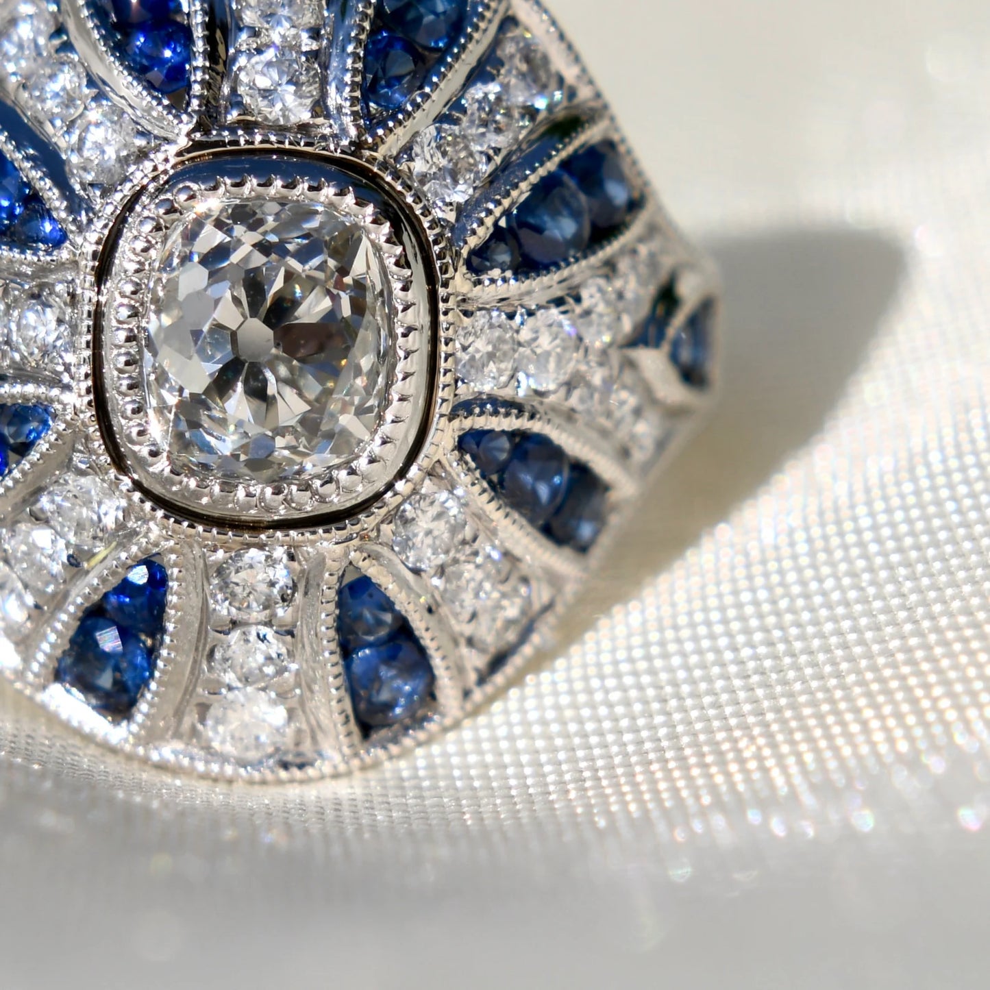 1.10ct old mine cut diamond and sapphire Bombé ring