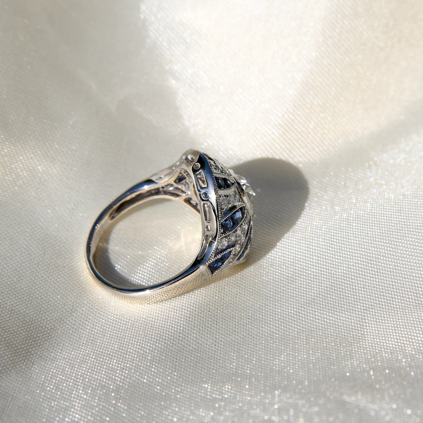 1.10ct old mine cut diamond and sapphire Bombé ring