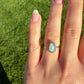 Opal pear and 0.32ct old mine cut diamond ring