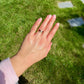0.30 ct peruzzi cut diamond and pear ruby three stone ring