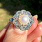 Antique Belle Époque natural pearl and 1.36 ct old European cut diamond daisy ring