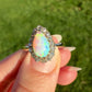 Opal pear and 0.32ct old mine cut diamond ring