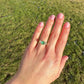 0.95 ct Colombian emerald and old mine cut diamond three stone ring