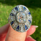 1.10ct old mine cut diamond and sapphire Bombé ring