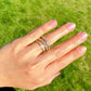 0.52 ct peruzzi cut diamond five stone band ring