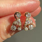 0.84 ct old mine cut diamond swirl stud earrings