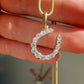 Antique 0.60 ct old European cut diamond horseshoe pendant