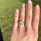 Antique natural pearl and 1.30 ct old mine cut diamond daisy ring