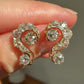 1.46 ct old mine cut diamond swirl stud earrings
