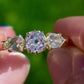 0.63 ct old mine and pear rose cut diamond three stone ring