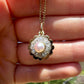 Antique natural pearl and 0.24 ct old mine cut diamond daisy pendant