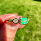 0.69 ct Colombian emerald and old pear cut diamond three stone ring